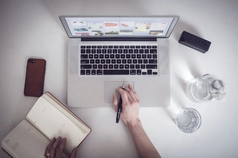 Person typing on a laptop
